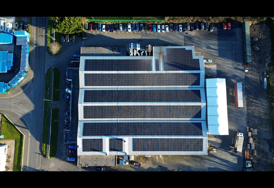 Drone view down to Solar panels on our factory roof, Pottington